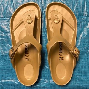 Birkenstock brand Gizeh Essentials sandal in Gold Metallic